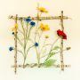 Den inramade blomsterängen