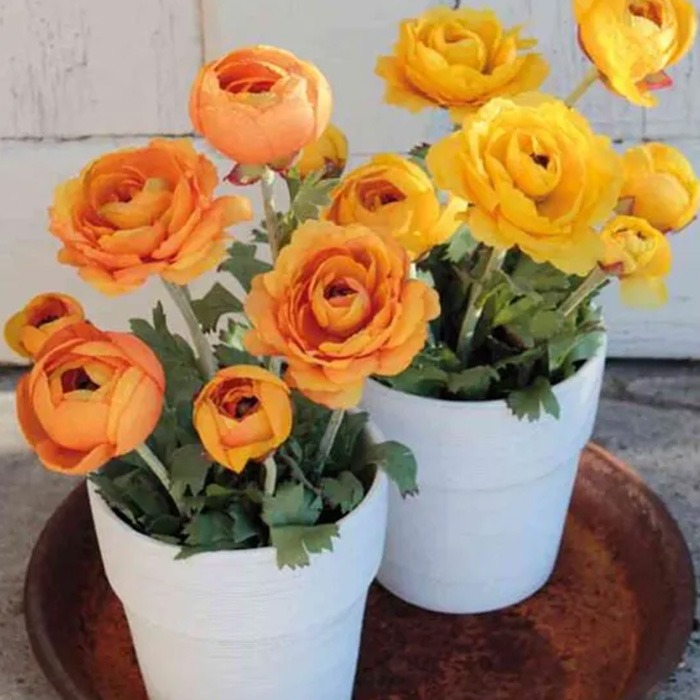 Konstgjorda blommor i kruka